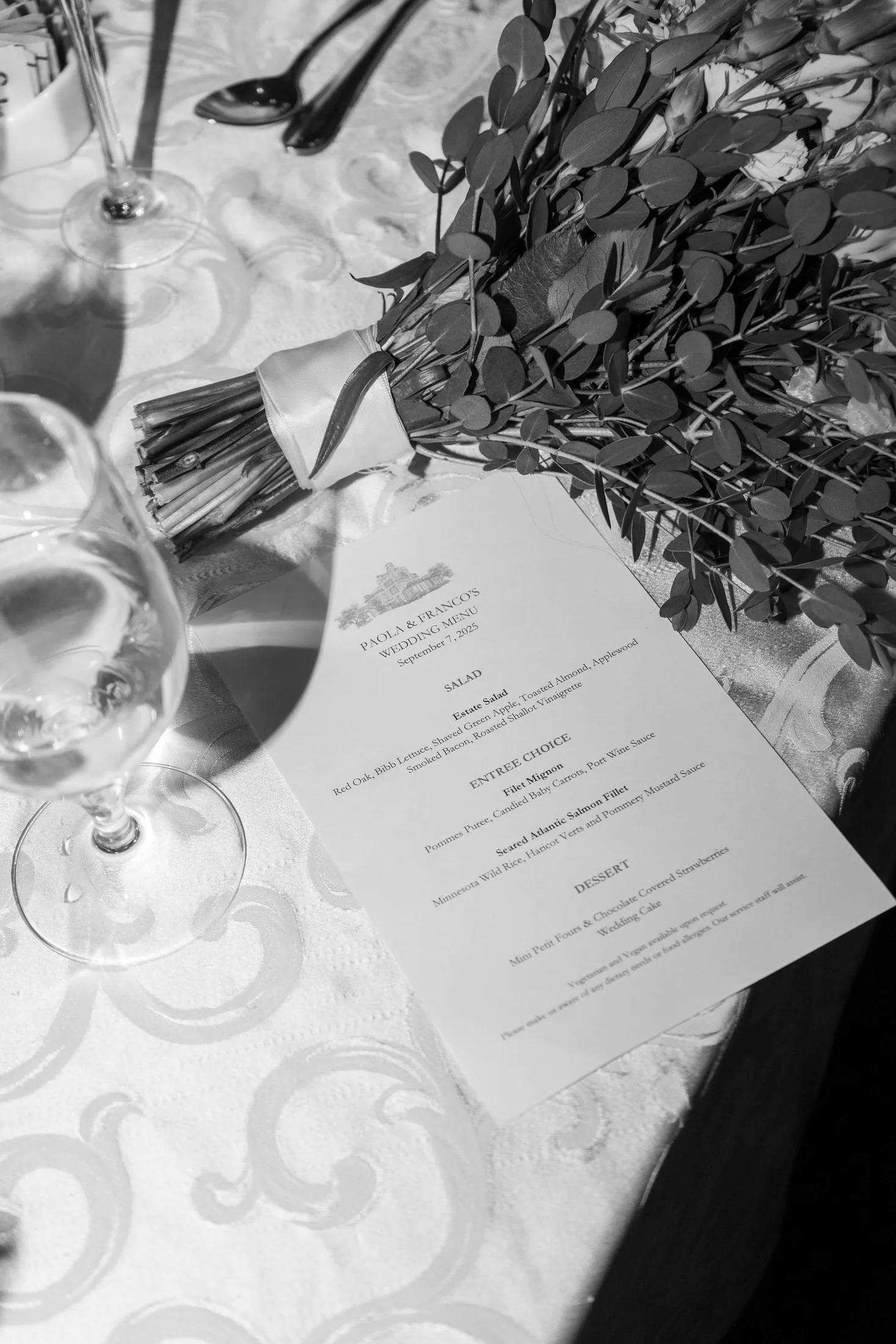 Black-and-white wedding stationery and reception details